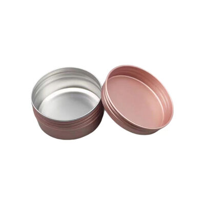 Tarro cosmético de aluminio de lujo en oro rosa con tapón de rosca