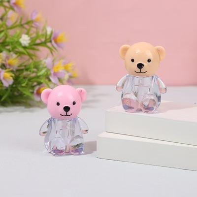 2 ml de tapa de cabeza de oso plástico tubo de esmalte labial en varios colores con cierre de tapa de tornillo e impresión personalizada