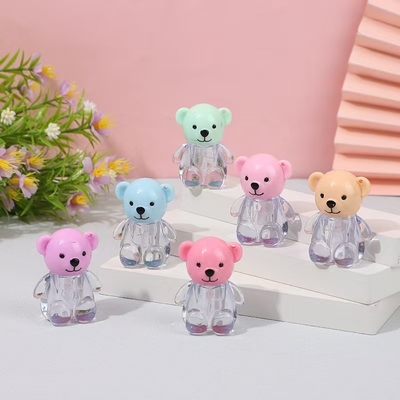 2 ml de tapa de cabeza de oso plástico tubo de esmalte labial en varios colores con cierre de tapa de tornillo e impresión personalizada