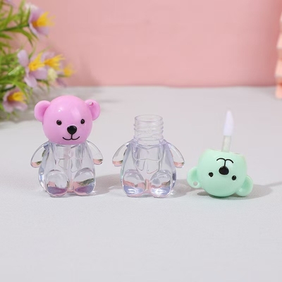 2 ml de tapa de cabeza de oso plástico tubo de esmalte labial en varios colores con cierre de tapa de tornillo e impresión personalizada