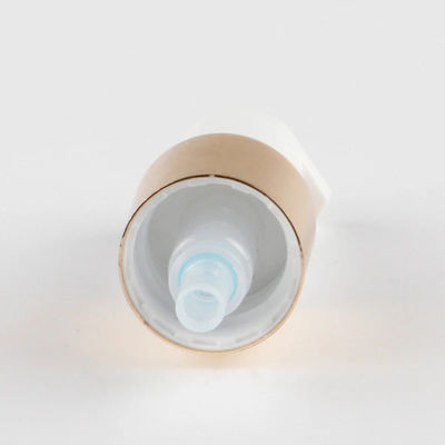 Bomba de loción cosmética de oro de lujo con actuador blanco para botellas de cuidado de la piel