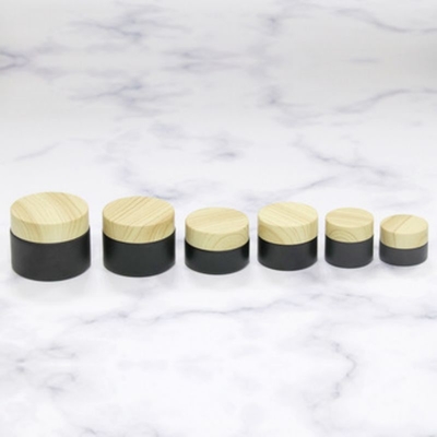 Jarrón de crema portátil de 10 g con tapa de madera para el cuidado personal Logotipo del cliente aceptable