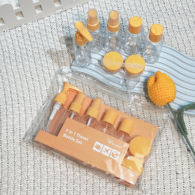 Estampado en caliente Botella de plástico de 50 ml para el set de viaje de cuidado de la piel de color personalizado