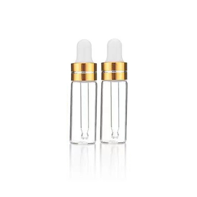 Botella de aceite esencial de vidrio transparente con gotero de aluminio conjunto completo