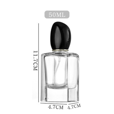 Botella de perfume de vidrio cuadrado de 50 ml de 100 ml de capacidad y tapa de forma irregular