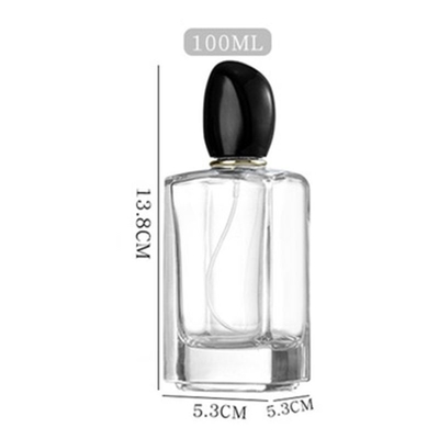 Botella de perfume de vidrio cuadrado de 50 ml de 100 ml de capacidad y tapa de forma irregular