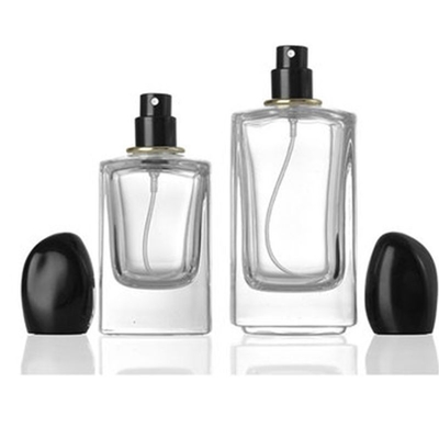 Botella de perfume de vidrio cuadrado de 50 ml de 100 ml de capacidad y tapa de forma irregular