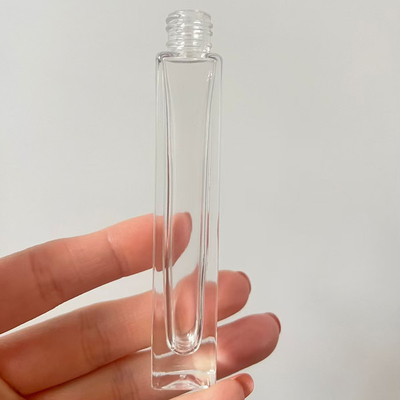 Botella redonda de perfume de 10 ml de vidrio personalizada con pulverizador y tapa