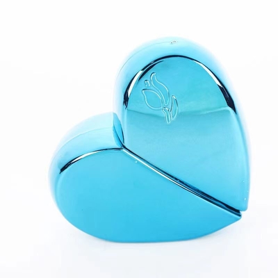 Botella de perfume de lujo de 30 ml en forma de corazón con colores pintados
