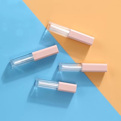 Contenedor vacío de plástico rosa de 1,2 ml con tubos de brillo labial con colores personalizados