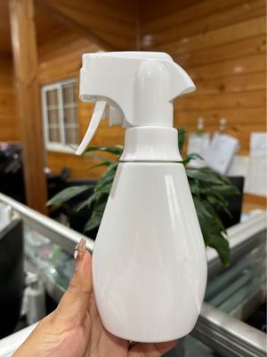 Botella rociadora de gatillo continuo de material PP al por mayor con color personalizado y MOQ de 10000 piezas