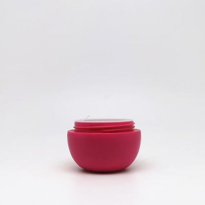 Tarro de crema esférico de plástico de 25 g con diseño ergonómico para facilitar su uso en el cuidado de la piel
