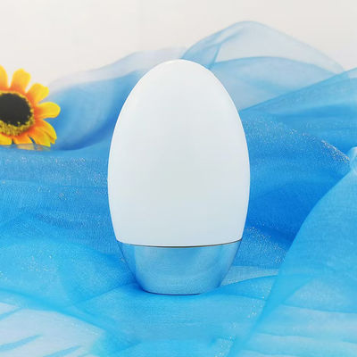 Botella de crema solar de forma ovalada de 50 g personalizada con tapa de plata UV para embalaje cosmético de 50 ml de PP