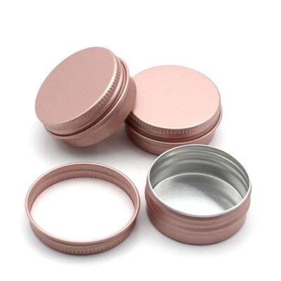 Tarro cosmético de aluminio de lujo en oro rosa con tapón de rosca