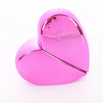 Botella de perfume de 25 ml en forma de corazón, portátil, cosmética, con estilo, con aerosoles para viajes, fácil de usar