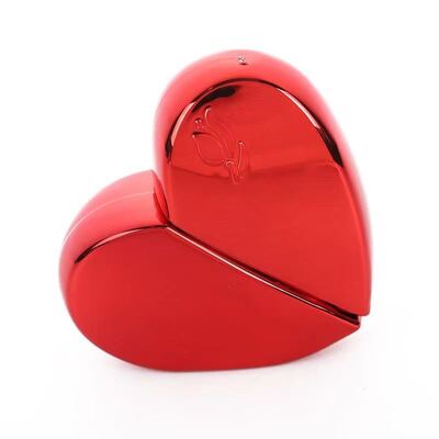 Botella de perfume de 25 ml en forma de corazón, portátil, cosmética, con estilo, con aerosoles para viajes, fácil de usar