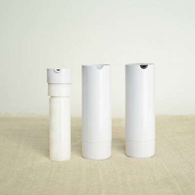 Botella de bomba sin aire de plástico de 30 ml 50 ml con bomba de loción de vacío en ABS + PP y color personalizado
